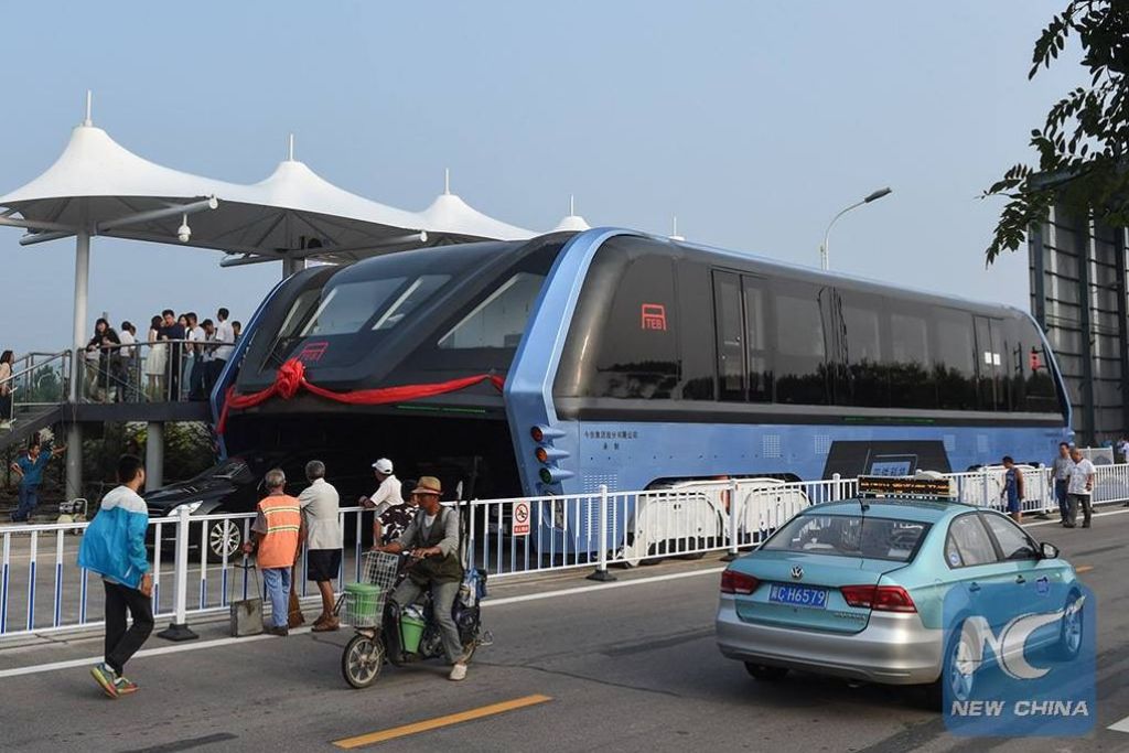 ÔNIBUS ELÉTRICO QUE NÃO INTERFERE NO TRÁFEGO ESTREIA NA CHINA, foto 2