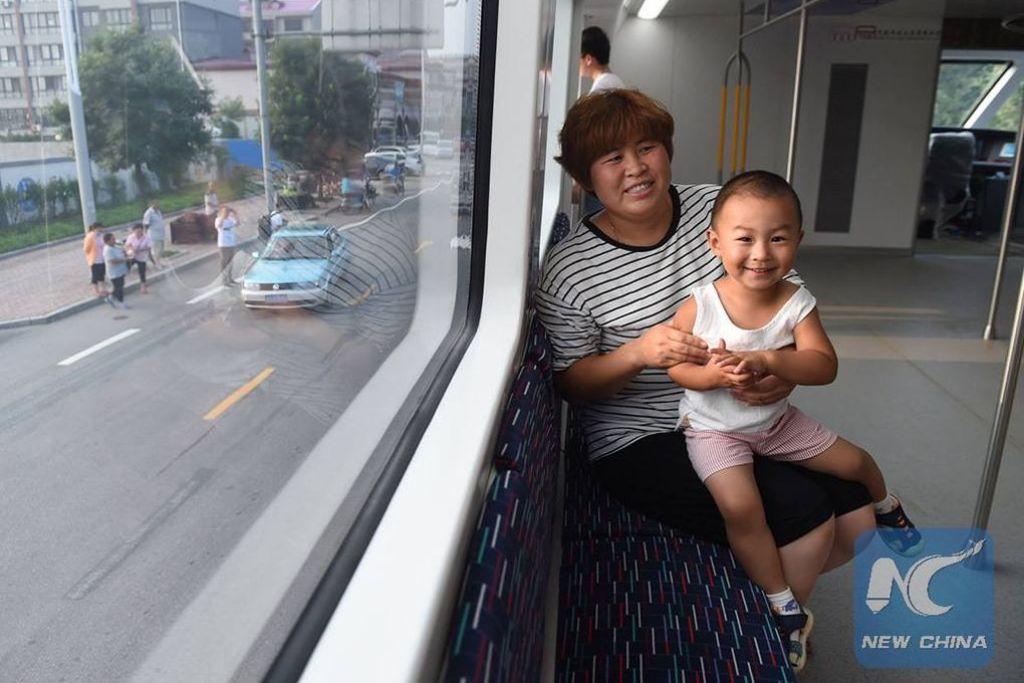 ÔNIBUS ELÉTRICO QUE NÃO INTERFERE NO TRÁFEGO ESTREIA NA CHINA, foto 4