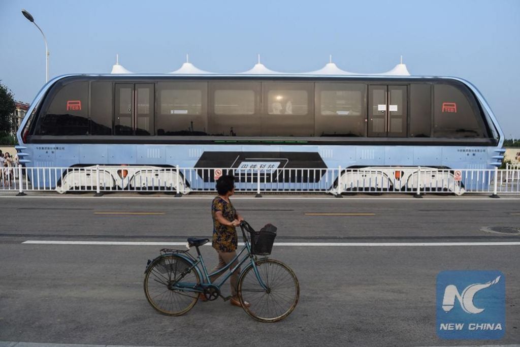 ÔNIBUS ELÉTRICO QUE NÃO INTERFERE NO TRÁFEGO ESTREIA NA CHINA, foto 5