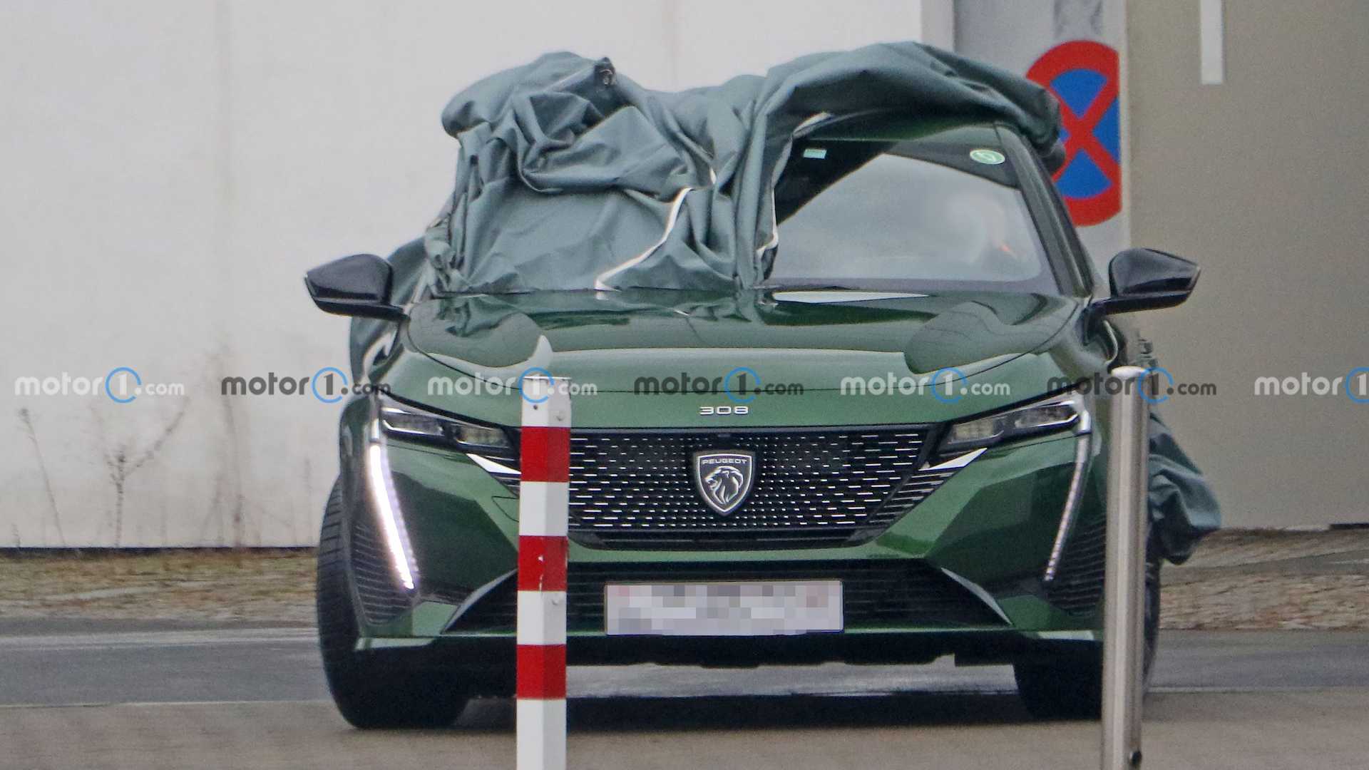 NOVO PEUGEOT 308 FOTOGRAFADO DESPIDO DE CAMUFLAGEM, foto 1